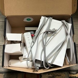 Nintendo Wii Gaming Console, Remotes, and chargers